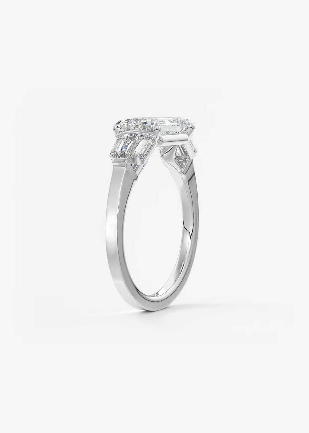 East West Emerald Cut Seven Stone Engagement Ring with Baguette Diamond Accents