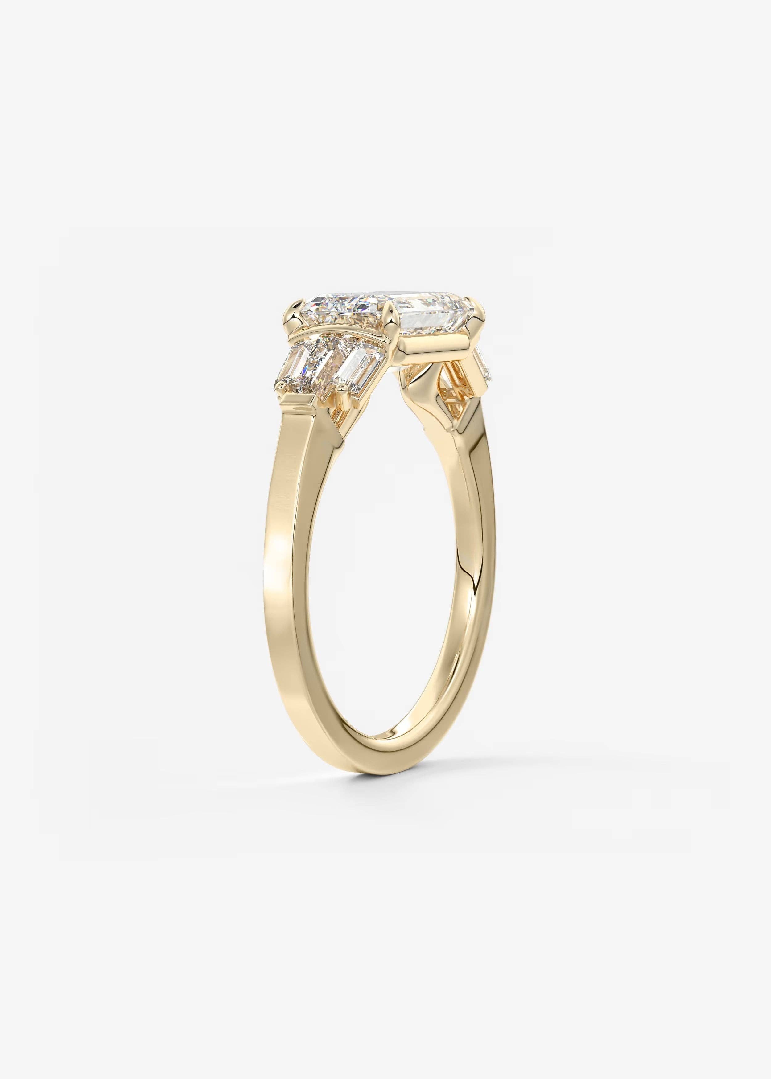 East West Emerald Cut Seven Stone Engagement Ring with Baguette Diamond Accents